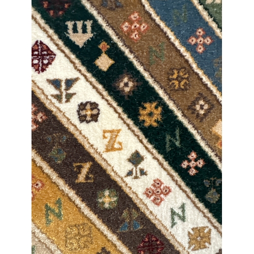 1521 - A fine woven Iranian runner with bespoke pattern and unique colours