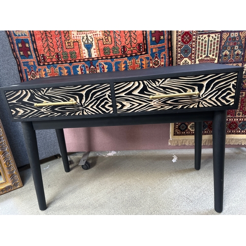 1531 - A two drawer zebra console table