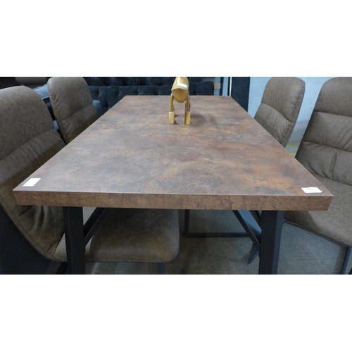 1472 - A copper effect top dining table with a set of four Mezan brown upholstered dining chairs