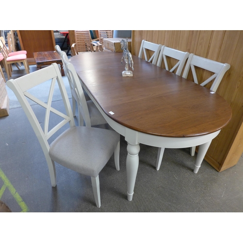 1475 - A dark oak top and white painted oval extending dining table with a set of six dining chairs