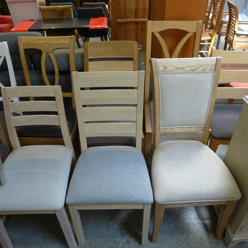 1536 - A miscellaneous lot of sixteen dining chairs, including wooden with upholstered seat, natural, white... 