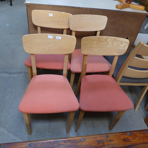 1538 - A set of four oak and red upholstered side chairs