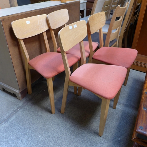 1538 - A set of four oak and red upholstered side chairs