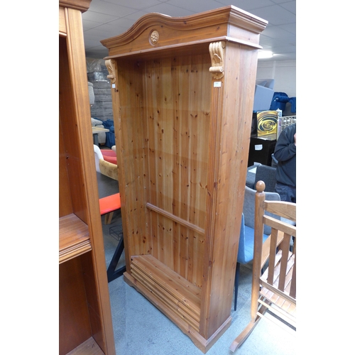 1543 - A carved pine open bookcase