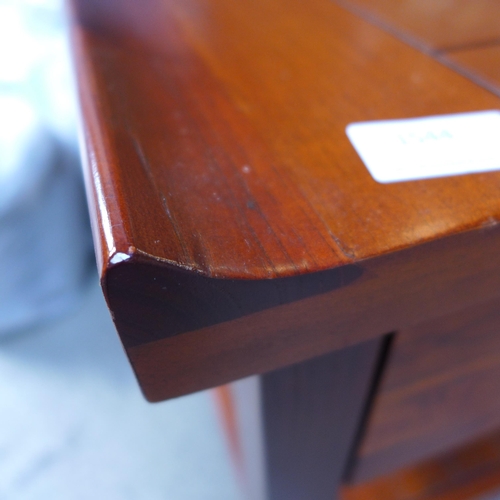 1544 - A pair of Cherrywood bedside chests