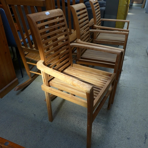 1545 - A set of three teak garden chairs