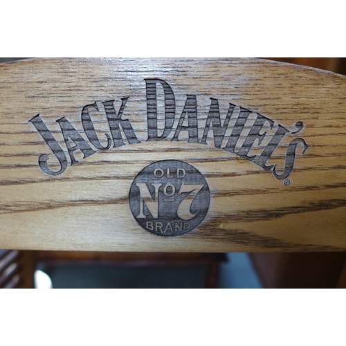 1547 - Hardwood Jack Daniels rocking chair