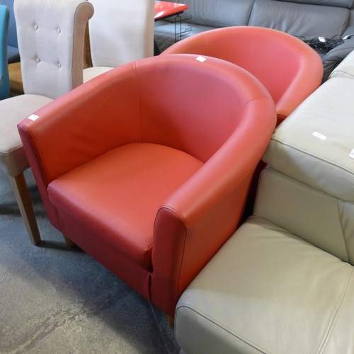 1549 - A pair of red leather effect tub chairs