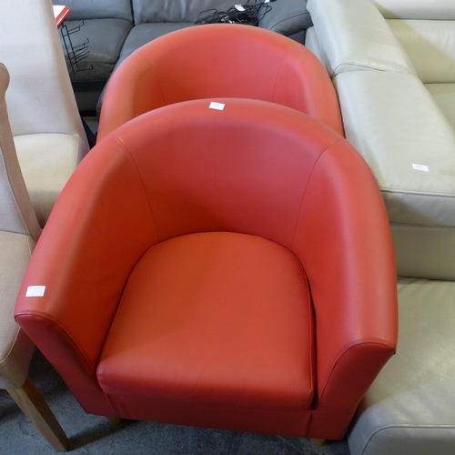 1549 - A pair of red leather effect tub chairs