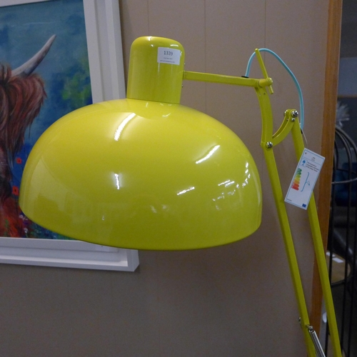 1339 - A yellow floor standing angle poise lamp