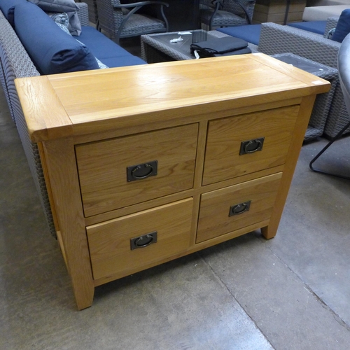 1448 - An oak four drawer chest