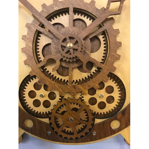 1393 - A wooden moving gears clock in the shape of an alarm clock