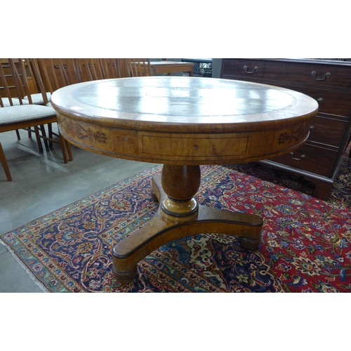 1 - A Regency birds eye maple and leather topped drum shaped library or rent table, manner of George Bul... 