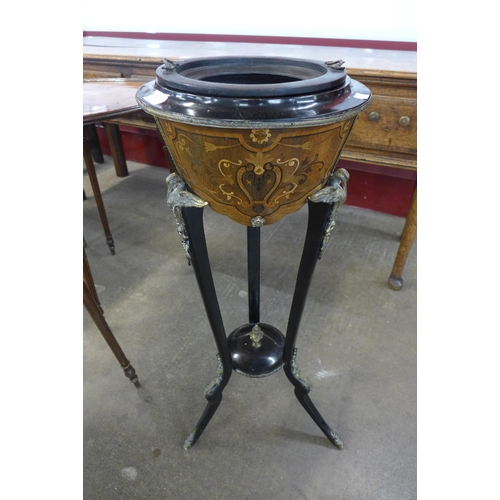 14 - A 19th Century French marquetry inlaid and ebonised jardiniere on stand