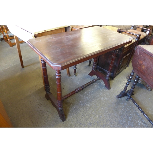 145 - A Victorian Japanned walnut bobbin turned Sutherland table and a Victorian beech stretcher table