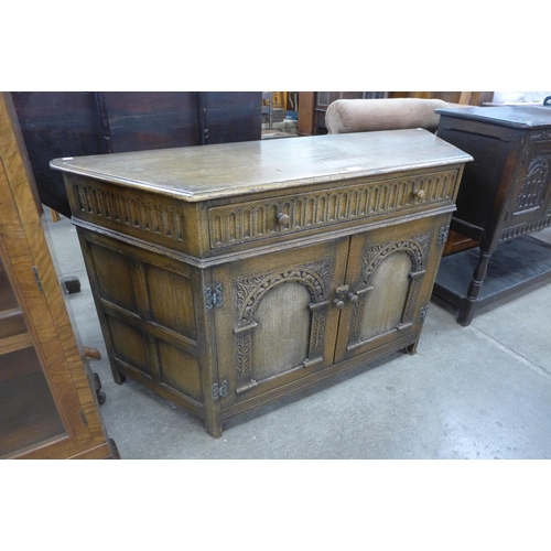 160 - A 17th Century style carved oak credence cupboard