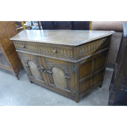 160 - A 17th Century style carved oak credence cupboard