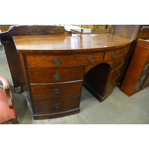 166 - A George IV mahogany bow front sideboard