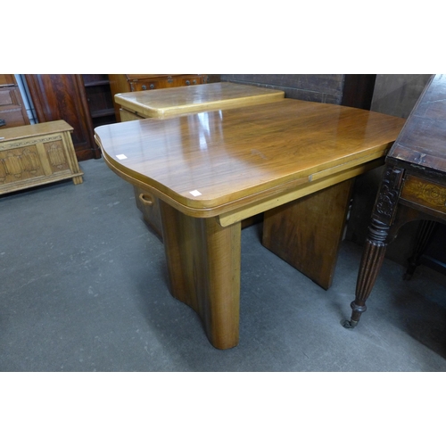 168 - An Art Deco walnut dining table and a walnut filing cabinet