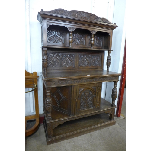 20 - An Elizabethan Revival carved oak dresser