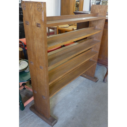 205 - A Gothic Revival carved oak open bookcase