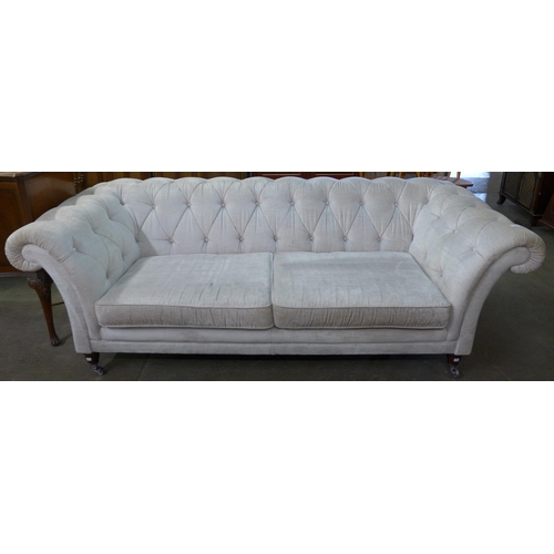 221 - A Victorian style fabric upholstered Chesterfield settee