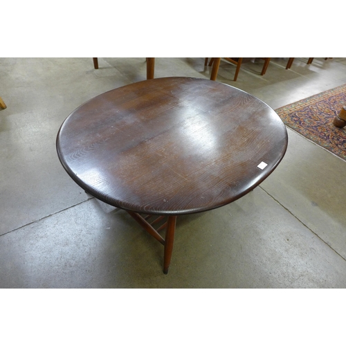 25 - An Ercol Golden Dawn elm and beech Windsor coffee table