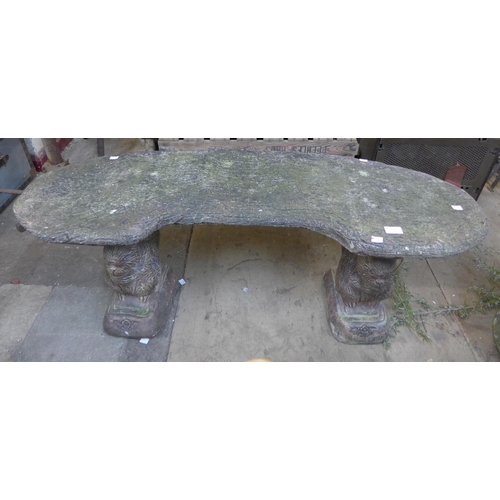 273 - A concrete squirrel based garden bench