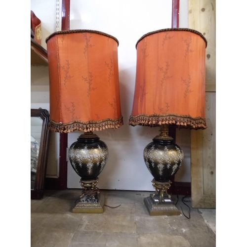 356 - A pair of French gilt metal and glass table lamps