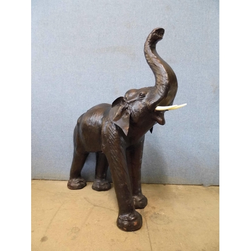 360 - A leather figure of an elephant