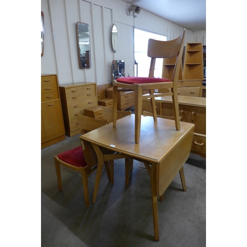 37 - A G-Plan Brandon light oak dining suite, comprising; sideboard, drop-leaf table and four chairs