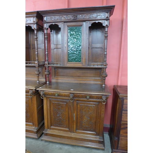 4 - A pair of 19th Century French Henry II style carved oak side cabinets