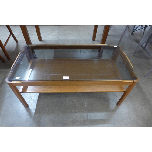 48 - A Myer teak and glass topped rectangular coffee table