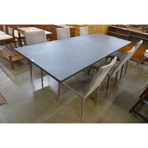 49 - An Italian Bonaldo black ash and metal based Octa dining table and six Filly dining chairs