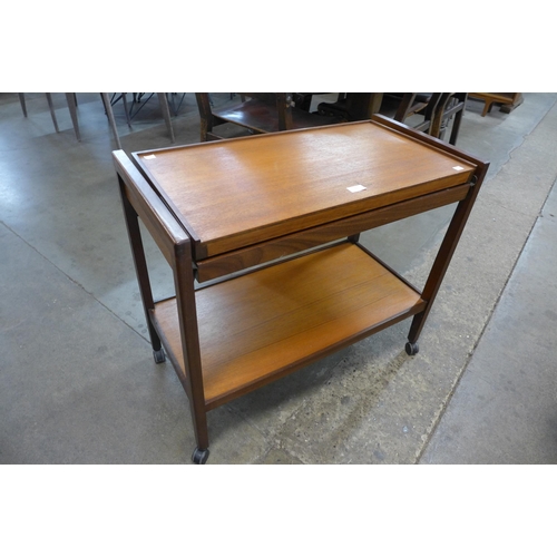 51 - A teak metamorphic trolley