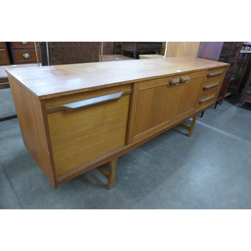 57 - A teak sideboard