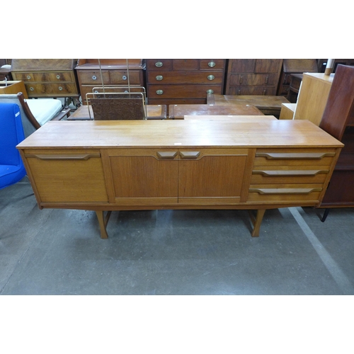 57 - A teak sideboard