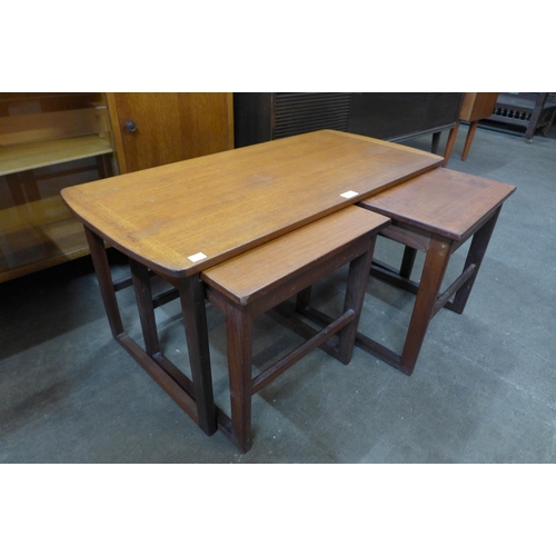 61 - A teak nest of tables