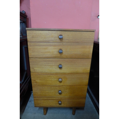 65 - An Avalon teak chest of drawers