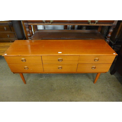 68 - A small teak sideboard