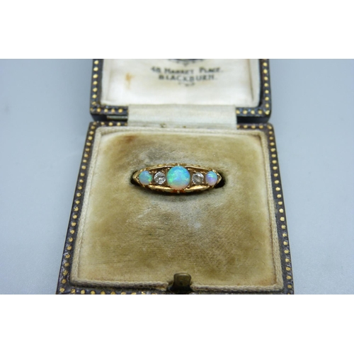 1001 - An Edwardian 18ct gold, opal and  diamond ring, Birmingham 1907, 3.3g, O