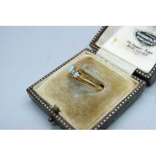 1001 - An Edwardian 18ct gold, opal and  diamond ring, Birmingham 1907, 3.3g, O