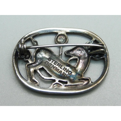 1010 - A Jensen style Danish silver brooch, marked Sterling, Denmark