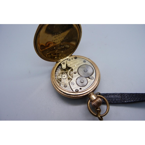 1032 - A rolled gold pocket watch, dial a/f