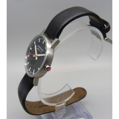 1043 - A Mondaine black dial wristwatch