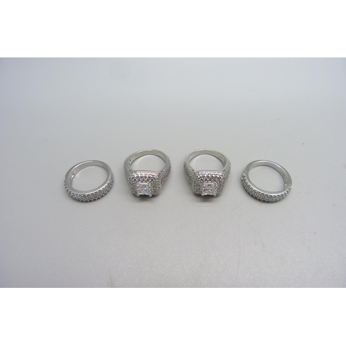 1071 - Four silver dress rings, stamped S925, new unused