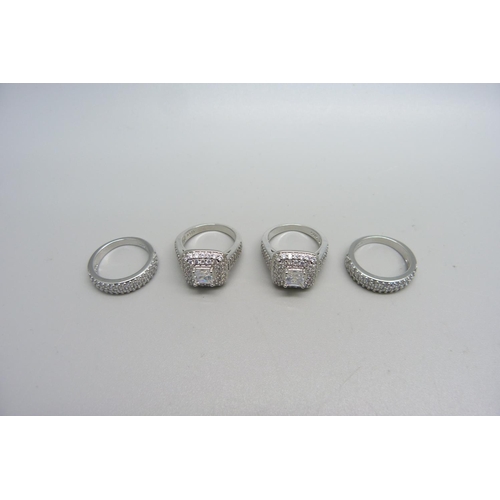 1073 - Four silver dress rings, stamped S925, new unused