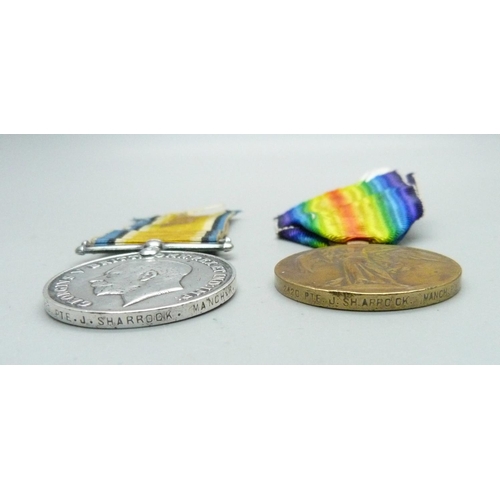 1087 - A pair of WWI medals, 2420 Pte. J. Sharrock Manch. R.