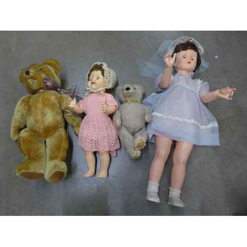 1145 - Two Teddy bears including one straw filled and two 1950's/1960's dolls  **PLEASE NOTE THIS LOT IS NO... 