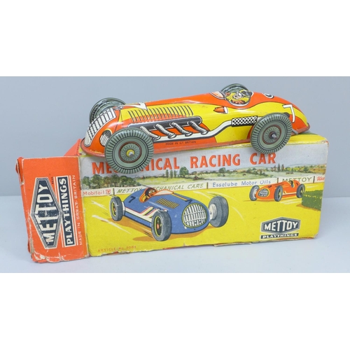 638 - A Mettoy No. 3084 tinplate mechanical racing car, boxed, box restored